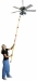 Changing a ceiling fan light bulb with a telescopic pole